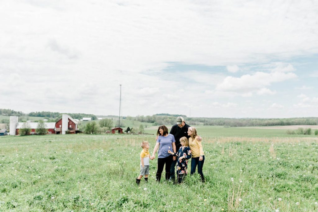 FreshOrr Farms family standing out in their field