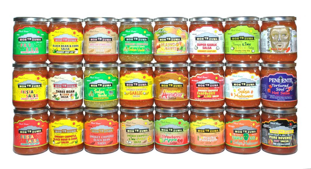 Three rows of dozens of Chuck Evans’ Montezuma Salsas