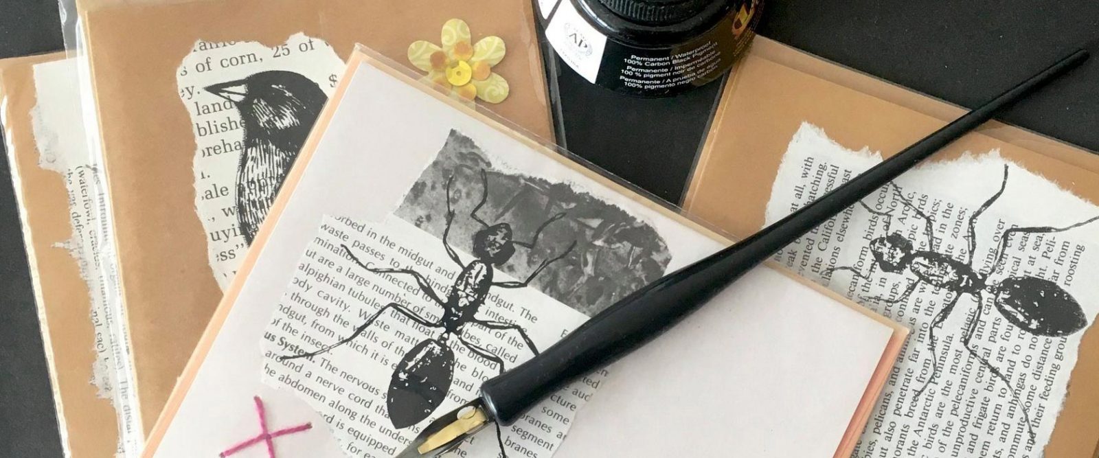 Handcrafted and drawn cards with fountain pen and ink bottle.