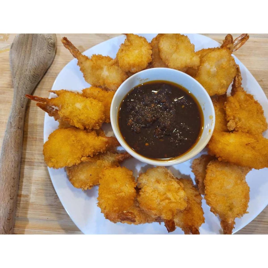 platter of fried shrimp with shito hot sauce